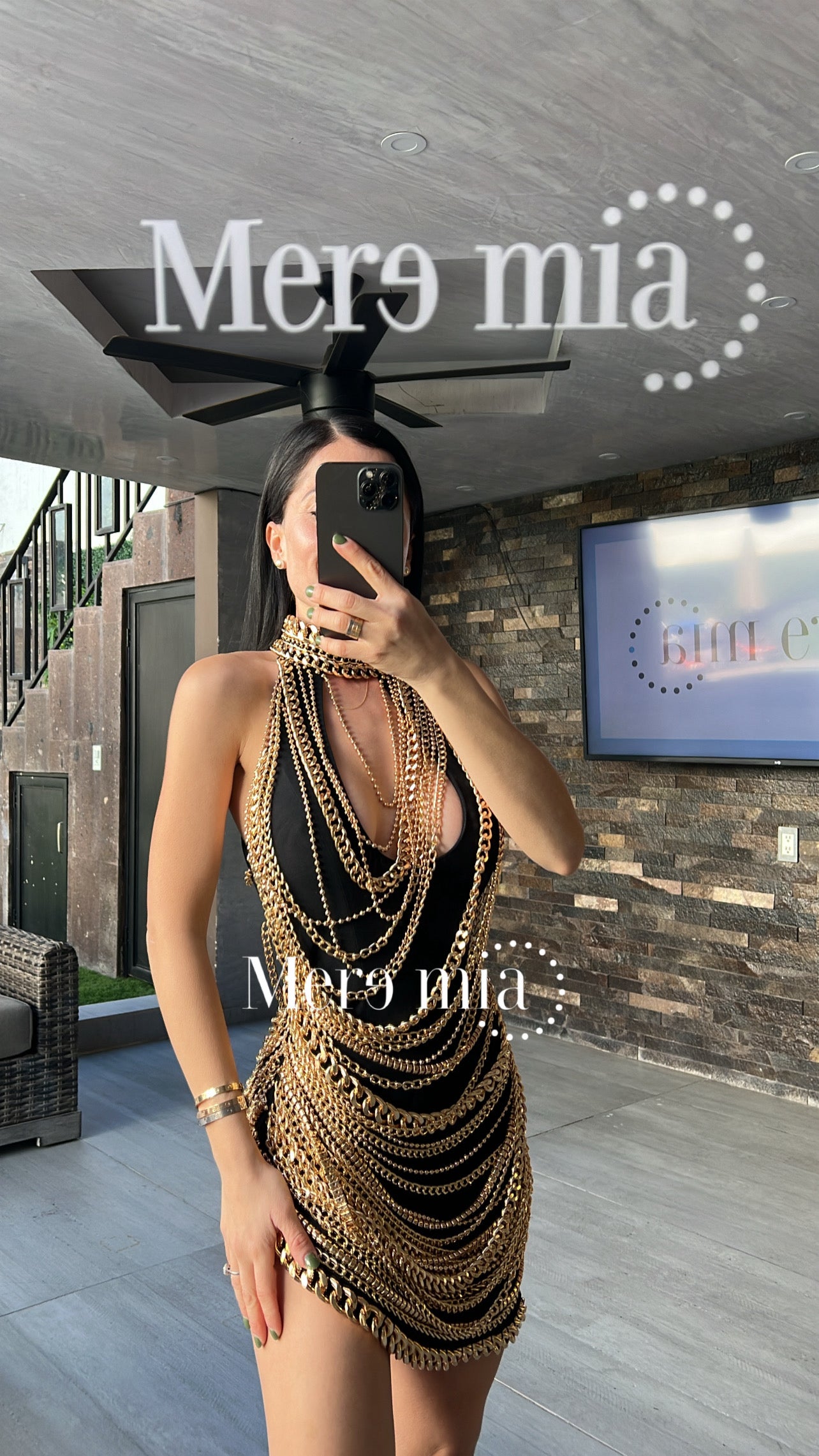 Vestido negro cadenas