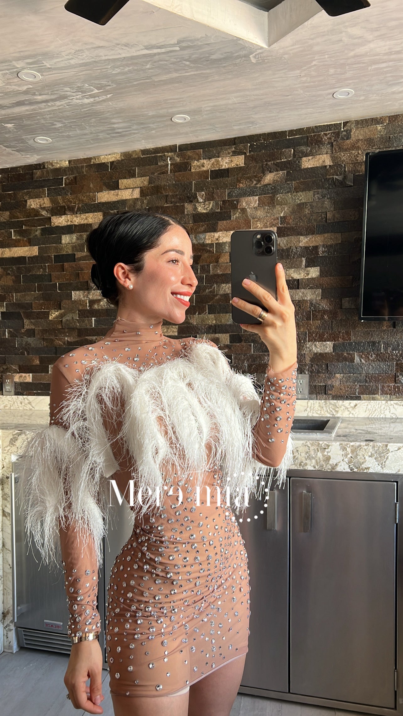 Vestido plumas corto